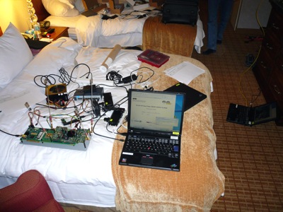 Testbed preparation activities in a hotel room in San Francisco, CA, USA